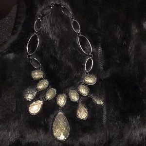 Glittery gold colored stone necklace
